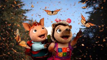 Wowsabout! TV: Ronald and Roxy watch in awe as butterflies fly in from every direction.
