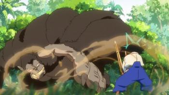 YAIBA: Samurai Legend TV Show: Yaiba holds up a weapon in defense against a giant gorilla