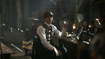 Young Sherlock TV show: Hero Fiennes Tiffin sits at a desk