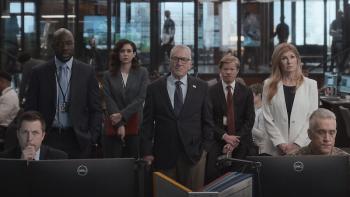 Zero Day TV show screenshot: A line of officials look forward, toward a screen