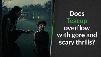 Mother kneeling down, reaching towards her son to comfort him