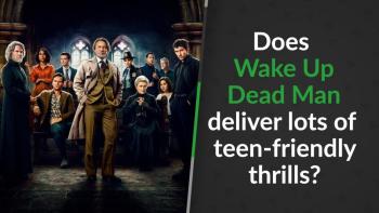 Private investigator Benoit Blanc (Daniel Craig) in a room filled with suspects