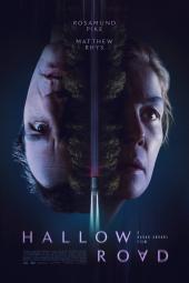 Hallow Road movie poster: Close-ups of Matthew Rhys and Rosamund Pike's faces are separated by a car driving in the dark with glaring headlights
