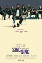 Sing Sing Movie Poster: Divine G (Colman Domingo) sits in a chair, several men sitting behind him, all in prison uniforms