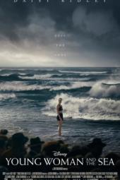 Young Woman and the Sea Movie Poster: Trudy stands on the shore in front of a dramatic sky and seascape
