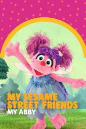 My Sesame Street Friends My Abby TV: Abby is in a colorful dress, with her arms wide open, a magic wand in hand, against a bright background.