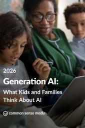 A woman and two children look at a laptop