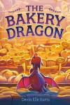 The Bakery Dragon book cover: Baby dragon looks into a bakery window filled with golden-colored baked goods and breads