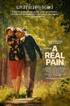A Real Pain movie poster: Kieran Culkin hugs Jesse Eisenberg while walking on a trail in the trees