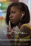 Dear Thirteen movie poster: Awa holds smartphone with earphones plugged in ear, wearing yellow dress and cornrows, some dialogue, credits, and title Dear Thirteen in white and green letters 