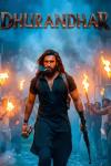 Dhurandhar movie poster: A shot of Ranveer Singh as he walks smoking and carrying weapons in his hands with men holding burning torches behind him
