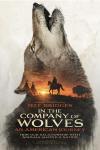 In the Company of Wolves: An American Journey movie poster: wolf silhouette with sunset scene of a rider and wolves.