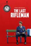 The Last Rifleman movie poster: Pierce Brosnan as a World War II veteran sits on bench against a red background
