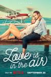 Love is in the Air movie poster: A couple lounges near a seaplane