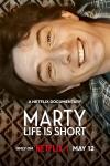 Marty, Life is Short: Martin Short lying on a floor.