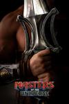 Masters of the Universe movie poster: He-Man holds a sword in front of his bare chest