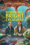 Remarkably Bright Creatures movie poster: Underwater scene with two people sitting, surrounded by sea life.