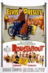 Roustabout movie poster: Elvis Presley sits on the back of a motorbike at a carnival
