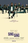 Sing Sing Movie Poster: Divine G (Colman Domingo) sits in a chair, several men sitting behind him, all in prison uniforms