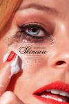 Skincare Movie Poster: Close up of Elizabeth Banks with heavy makeup and smeared mascara holding a cotton ball to her cheek