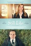 Still Life movie poster: Eddie Marsan lays in the grass and Joanne Froggatt stands on a train, both smiling