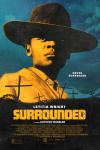 Surrounded Movie Poster: Mo Washington (Letitia Wright), wearing a cowboy hat, stares defiantly toward the sky