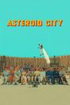 Asteroid City Movie Poster: Three rows of people dressed for the 1950s, some in black and white, sitting in chairs inside a crater with a teen boy who