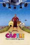 The Castle movie poster: A White man with mustache wearing a dressing gown stands in front of his house while an airplane flies above him