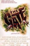 The Gate Movie Poster: A creature's hands emerge from a hole in the ground.