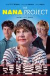 The Nana Project Movie: An older woman sits smiling behind a chess table; behind each shoulder is a young man looking on.