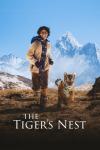 The Tiger's Nest movie poster: A young Indian boy smiles as he runs alongside a baby tiger on some mountains.
