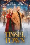 Tinsel Town movie poster: Rebel Wilson and Kiefer Sutherland stand in a snowy street