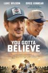 You Gotta Believe movie poster: Luke Wilson and Greg Kinnear smile above a Little League baseball team celebrating on a field