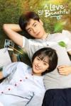 A Love So Beautiful: TV Image, a male and female late teen Chinese couple lying in the grass smiling at the camera