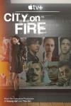 City on Fire TV show: a woman stands on a subway platform in front of posters of the characters on the show