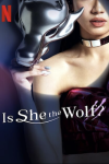 Is She the Wolf? TV show poster: A woman's partial face and bare shoulder visible as she holds mask. 