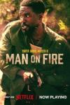 Man on Fire TV show poster: Yahya Abdul-Mateen II grips a handgun. He wears a white tank top and grey buttoned shirt.