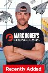 Mark Rober's CrunchLabs Poster Image: Engineer Mark Rober poses in front of some gadgets