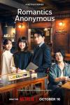 Romantics Anonymous TV show poster: young men and women of Japanese and Korean descent standing by chocolates in a dark room