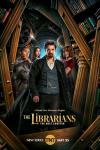 The Librarians The Next Chapter TV:  Vikram, Connor, Charlie and Lyra stand in the center, surrounded by angular walls of book cases and old columns. 
