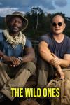 The Wild Ones TV show poster: Two men sit facing the camera wearing t-shirts, cargo pants, and sun protection accessories, looking adventure-ready