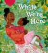 While We're Here book cover: Mother holding a child with a pink tutu on a green leafy background